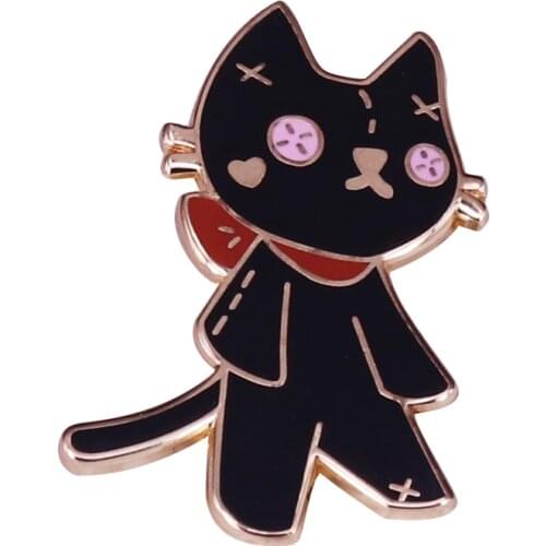 Black cat with stitched button eyes brooch pin inspired by dark fantasy childrens film Coraline