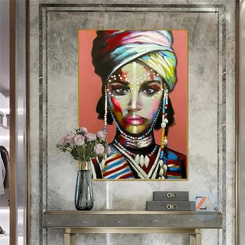 African womens graffiti posters and abstract printed oil paintings on the walls of African girls
