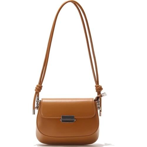 Leather Bag Girl 2021 New Fashion Korean Version of Womens Bag One Shoulder Under The Bag Hand-held Saddle Bag A Hair