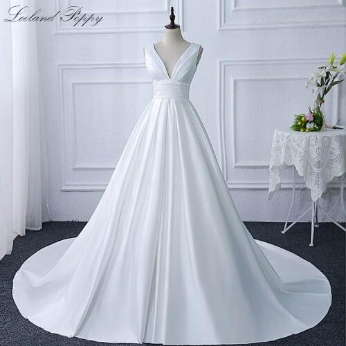 Lceland Poppy A-line Satin Wedding Dresses 2020 Simple Sleeveless V-neck Pleated Floor Length Bridal Dress Empire Waist Lace Up