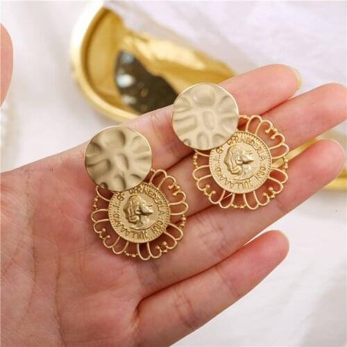 Korean version of retro temperament metal atmosphere French round portrait asymmetric earrings delicate personality earrings cli