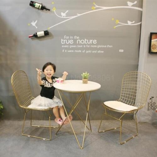 Net red casual tea shop table and chair combination three-piece simple baking balcony small coffee table coffee table and chairs