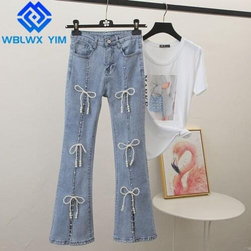 High Waist Split fork Jeans Women Fashion Beaded bow Decoration Loose Washed Jeans SpringAutumn Womens Denim Flare Pants 2021