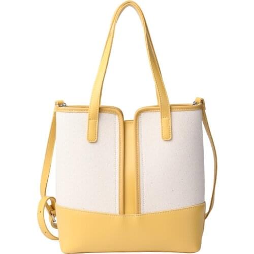 2021 New Korean Leisure PU Leather Handbag Simple Canvas Splicing Bucket Bag Net Red Fashion One Shoulder Messenger Bag