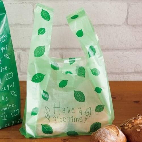 Green leaves Plastic Gift Bags, Plastic shopping bags,Tote Bag Waistcoat Bag 100pcs/lot