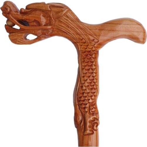 A mahogany cane Peach-Shaped Mantou leading Phoenix wood carving handicraft decoration gifts sent to the elderly parents birthda