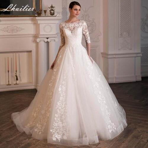 Lhuilier A-line Scoop Neck Tulle Wedding Dresses 2020 Court Train Half Sleeves Lace Appliques Bridal Dress with Empire Waist