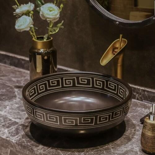 China Artistic Handmade black Ceramic Lavobo Round Counter top Bathroom Sink Wash Basin bathroom shampoo sink