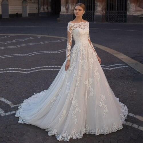New Design Boat Neck Long Sleeve Beads Appliques Lace Button A-Line Wedding Dress 2021 Vestido De Noiva Bridal Gown