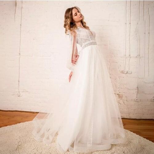 Bohemian Wedding Dress A-Line V-Neck Lantern Sleeve Lace Appliques Button Tulle Floor Length Sweep Train Bride Gown 2021