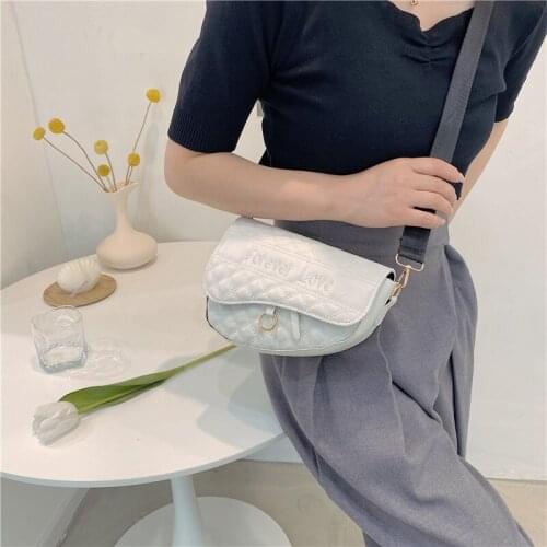 On the new texture of rhomboid alphabet embroidered bag ladys new pearl bag chain one shoulder slanting cross bag saddle bag