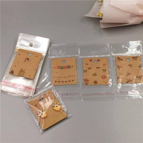 Creative 50pcs Stud Ear Small Card + 50pcs Transparent Plastic Hanging Bag，5x4cm Lovely Jewelry Earring Packaging Sale Card