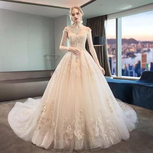 Wedding Dresses Illusion O-Neck Short Backless Sequined Beading Embroidery Tulle Lace Luxury Champagne Women Bridal Gown GB486