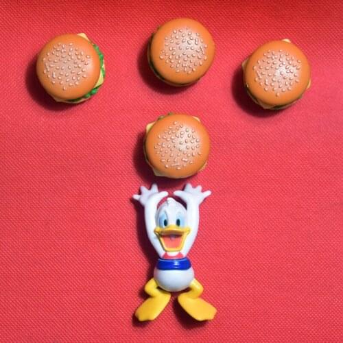 12PCS 7.5cm High quality cute Donald Duck cartoon doll hand model DIY decoration