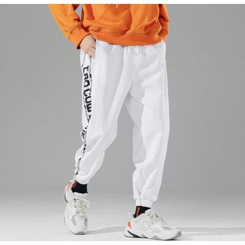 Fashion Men Casual Pants Spring Autumn Mens Trendy Wild Letter Print Harem Pants Male Street Hip Hop Pants Brand Clothing