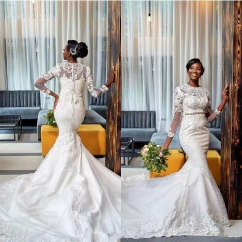 African Plus Size Mermaid Wedding Dresses Long Sleeves Lace Appliqued Crystal Beaded Sweep Train Wedding Gowns