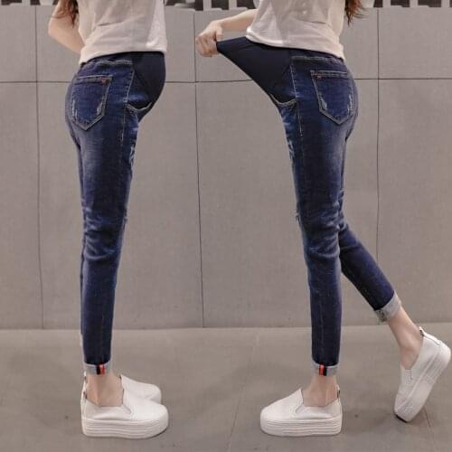 Pregnant women jeans spring 2018 new tide mother stomach lift pants nine pants pants stretch feet pants wear