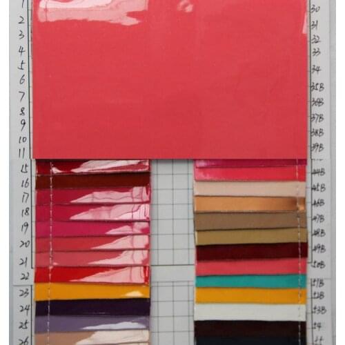 Quality Mirror oil leather luggage bags artificial PU leather fabric crystal pearl coat of paint faux leather material