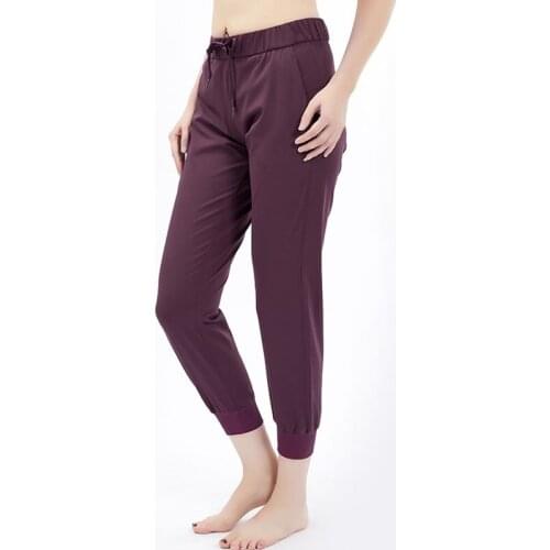 Women Naked-feel Fabric Loose Fit Sport Active Lounge Jogger Butter Soft Elastic Leggings with two side pockets 7/8 pants