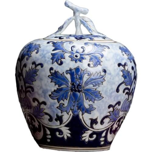 Jingdezhen ceramic storage tank blue and white porcelain relief apple jar Chinese living room TV cabinet snack pot