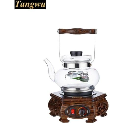 An electric kettle with a thick glass