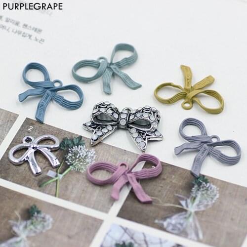 PURPLEGRAPE Alloy bow DIY earring material Gift box packaging hanging headdress stationery accessories retro bow tie 10pcs