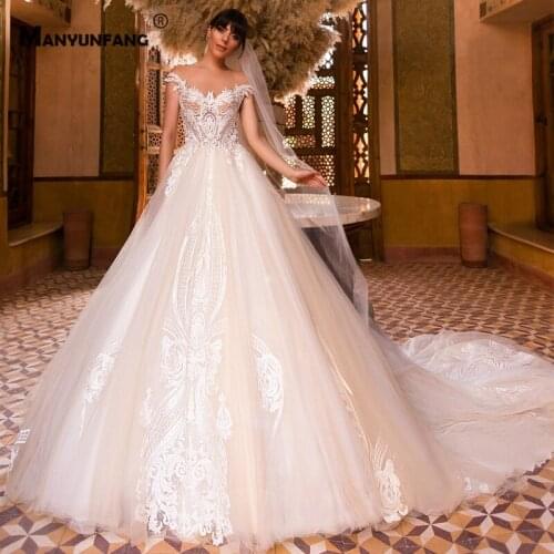2021 Hot Sale Illusion O-Neck Embroidery Appliques Tulle Cathedral Train Bridal Ball Gown Luxury Cap Sleeve Zipper Wedding Dress