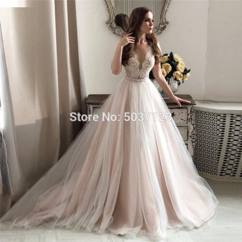 Sheer O Neck Cap Sleeves A Line Dusty Pink Wedding Dresses Lace Appliques Vestido de Noiva Buttons Back Sweep Train Bridal Gowns