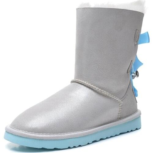"Women 's boots sheep fur leather boots to keep warm and comfortable flat girl boots integrated waterproof non-slip rubber sole