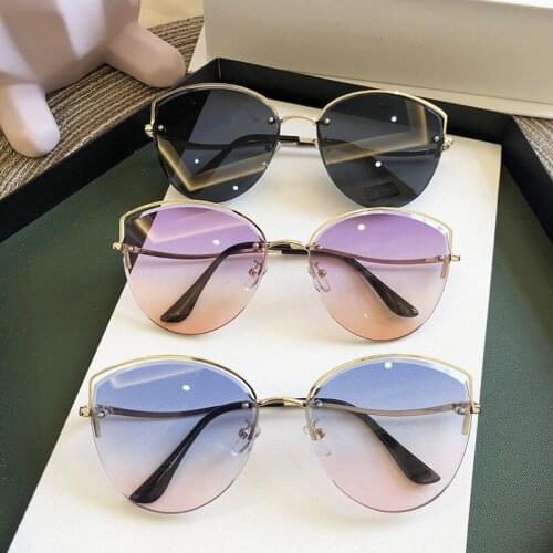 Korean personality pink cats-eye glasses lovely womens Sunglasses small face street photo fashionable rimless Sunglasses