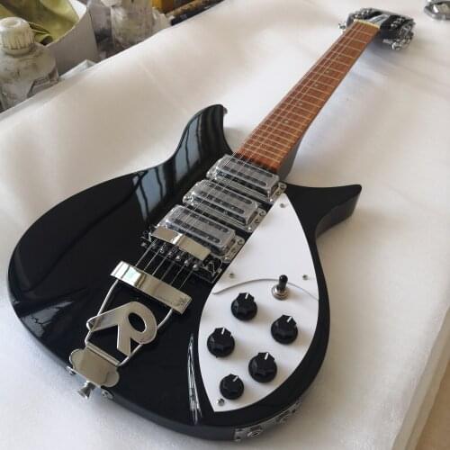 12-string electric guitar has varnish on its fingerboard