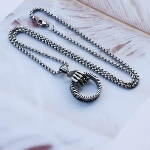 DUTRIEUX 2021 New Fashion Punk Skull Hand Circle Pendant Necklace for Men Women Stainless Steel Pendant Necklace Jewelry Gift