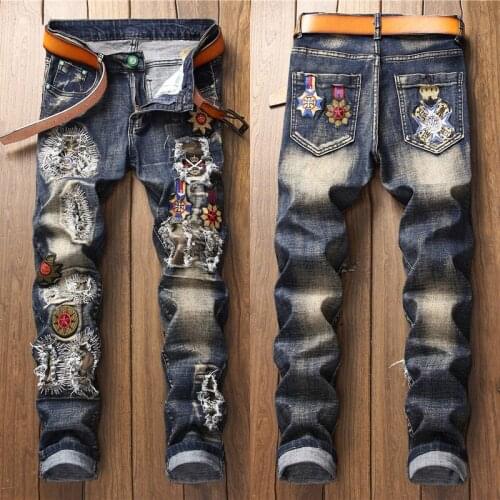 Men’s patched embroidery slim blue jeans hole ripped street fashion denim pants men hard washed casual pants jeans