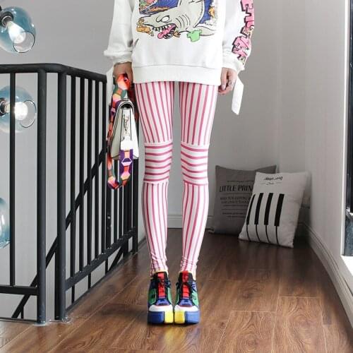 Spring and autumn Korea fashion personality fluorescent pants vertical stripes knee stitching bottom womens red pants thin