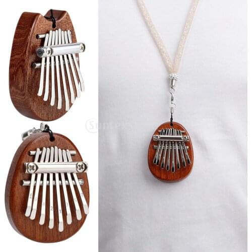 Exquisite 8 Keys Mini Kalimba Thumb Piano Mbira Solid Wood Toy With Lanyard Pendant Can Play Gifts