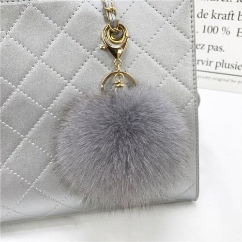 2021 Genuine 9CM Fox Fur Pom Poms Women Bag Bug Luxury Brand Bag Charm Bugs Pompom gold Keychain Luxury Pendant