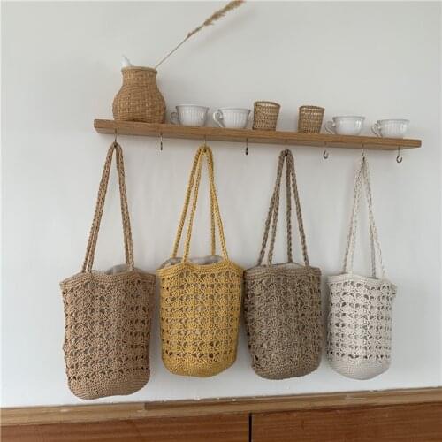 2021 New Holiday Style Elastic Mouth Hand Woven Hemp Rope Womens Straw Single Shoulder Bucket Bag
