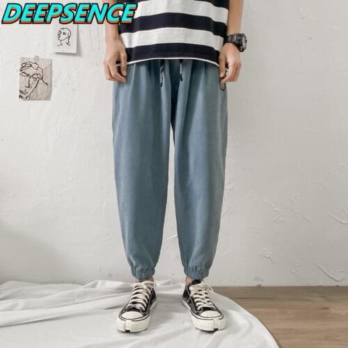 2021 New Four Season Casual Cargo Pants Men Korean Drawstring Letter Print Pant Chic Fashion Streetwear Loose Pencil Pants Men
