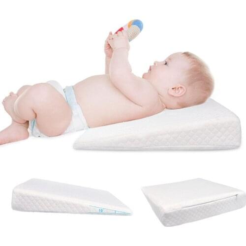 New Solid Soft Portable Newborn Baby Sleep Pillow Anti Baby Spit Milk Crib Cot Sleep Positioning Wedge