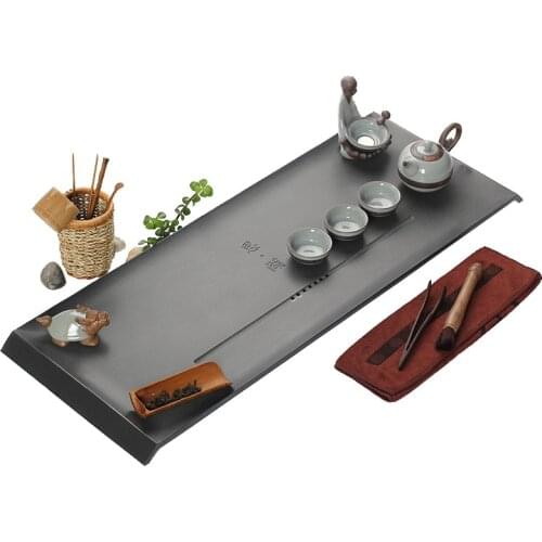 On sales Chinese heavy tea tray for kungfu tea set black stone tea table weighted serving tray tea boat water draining ball pipe