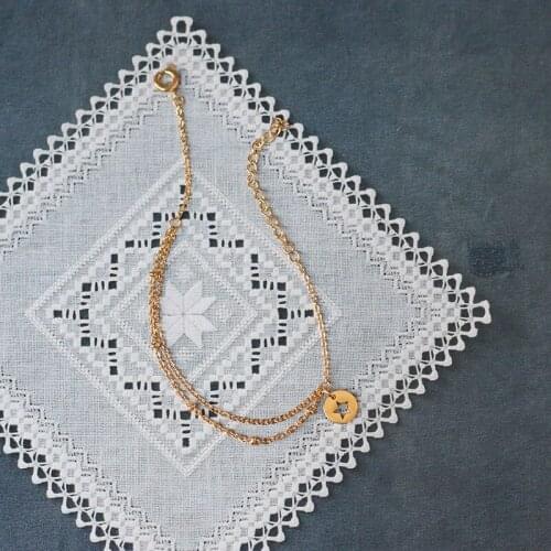 Five-pointed star round brand hollow chain round bead bracelet titanium steel plated with 18K gold color retention temperament