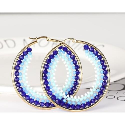 Stainless steel earrings with high-grade rice beads braided by hand