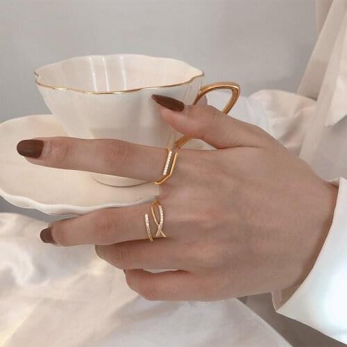 ALLNEWME Simple Shiny Rhinestones Charm Rings for Women Girls Brass Gold Hollow Layered Irregular Geometric Adjusting Open Ring