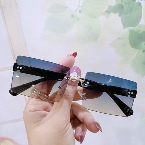 Fashion Mens Womens Trending Sunglasses Square Glasses American Style Rimless Trimming Luxury Vintage Decorative Glasses UV400