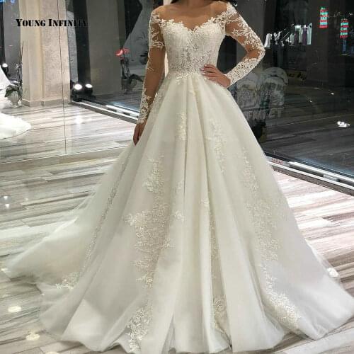 New Arrival Ball Gown Wedding Dresses 2021 Long Sleeves Bridal Gown Lace Up Scoop Chapel Train Applique White Plus Size Bride