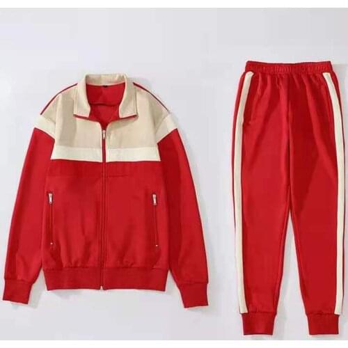 The new autumn and winter contrast color European station mens and womens sports and leisure zipper jacket and two-piece pants