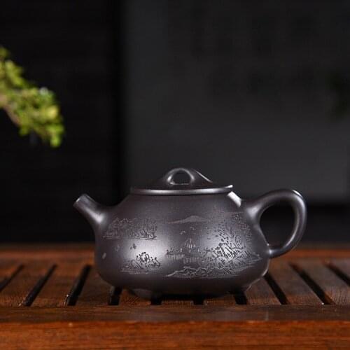 Authentic handmade undressed ore black mud landscape stone gourd ladle pot of kung fu tea set wholesale the teapot