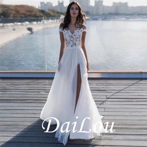 A-Line Wedding Dresses Off Shoulder Sweep / Brush Train Lace Short Sleeve Beach Illusion Detail with Appliques Split Front 2021