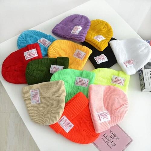 1-7 Child baby Autumn Winter Warm Knit hat Letter patch Skull ear protectors cap girl Boy Beanie Solid color hedging cap Z145
