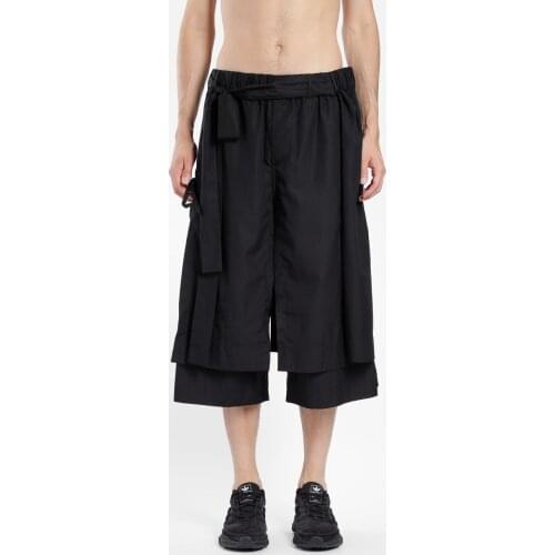The new mens Capris are a pair of pants, loose pants, wide leg pants, casual large pants, trendy men